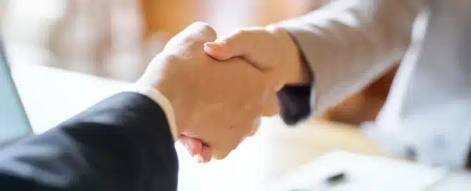 entrepreneur reviewing business acquisition loan documents and financial plans in burlingame california for small business financing options