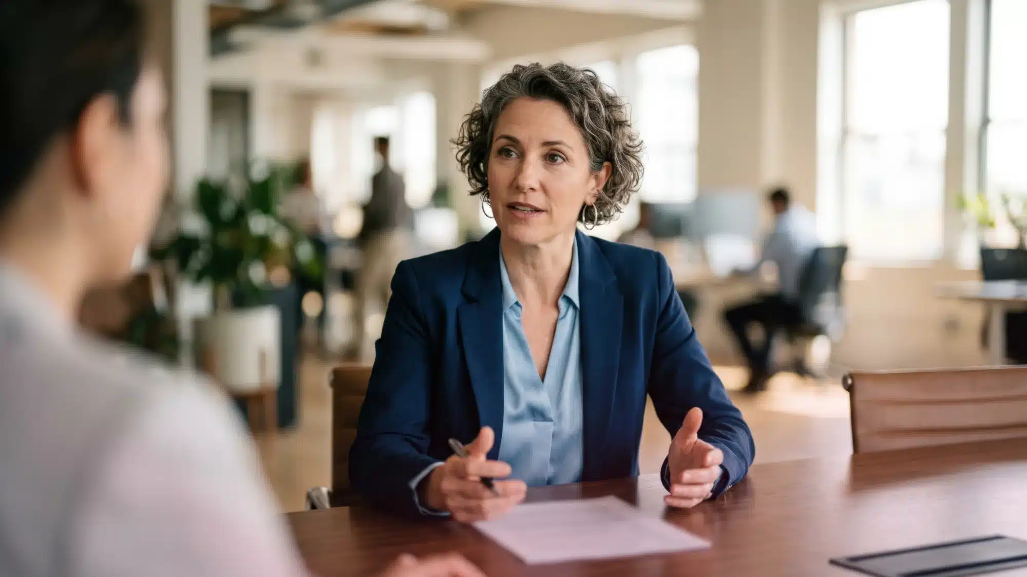 Business owner reviewing financial documents and cash flow with a business line of credit showing access to flexible financing for California companies